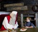 Santa Claus receives a wish list from a